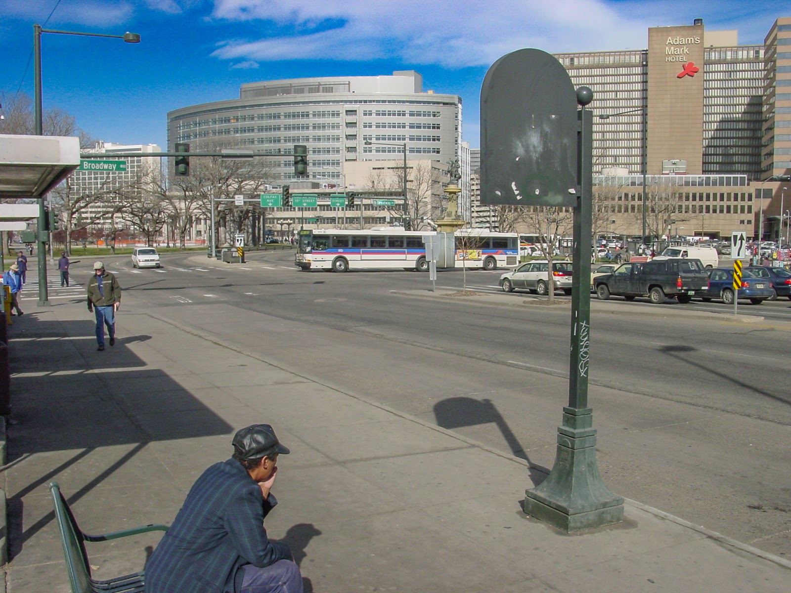 A patron at a downtown bus stop