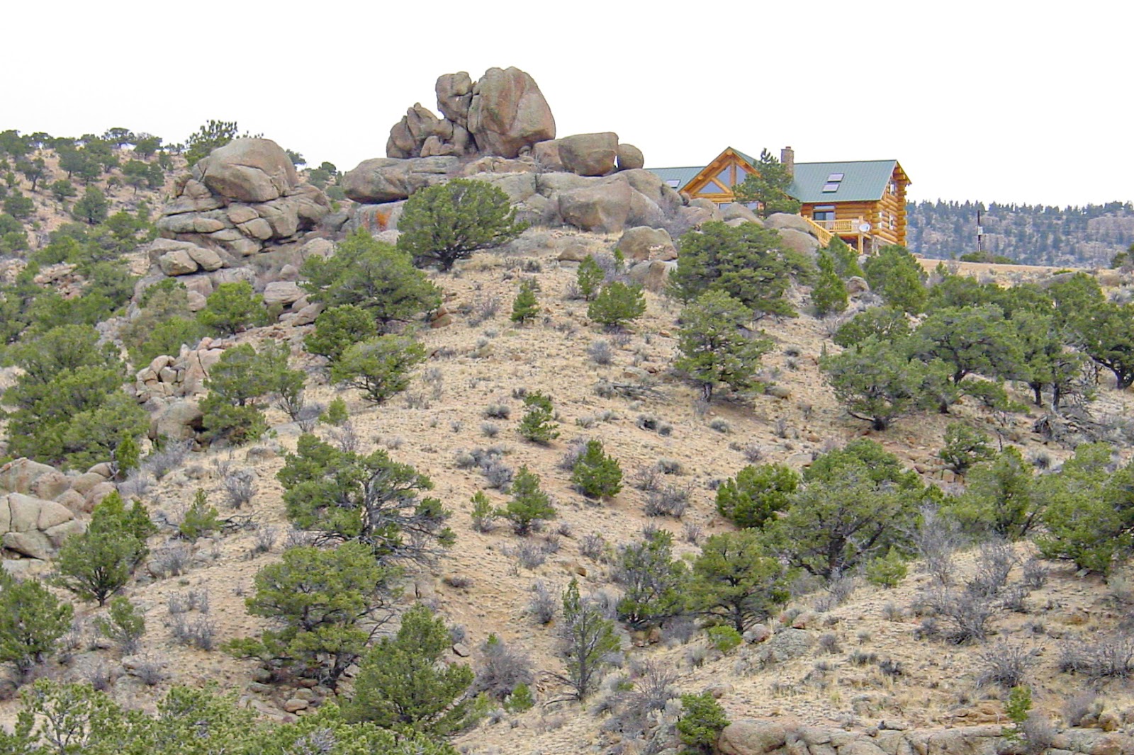 A log ranch on a rocky horizon 