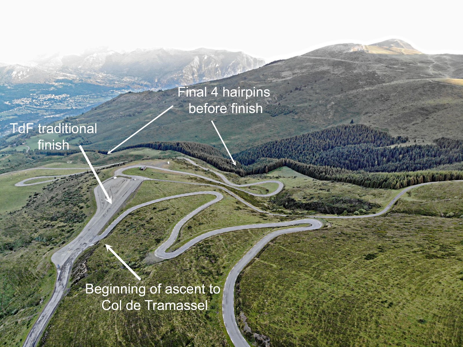 aerial drone view of the beginning of the ascent to Col de Tramassel, the traditional Tour de France finish, and the final 4 hairpins before the finish