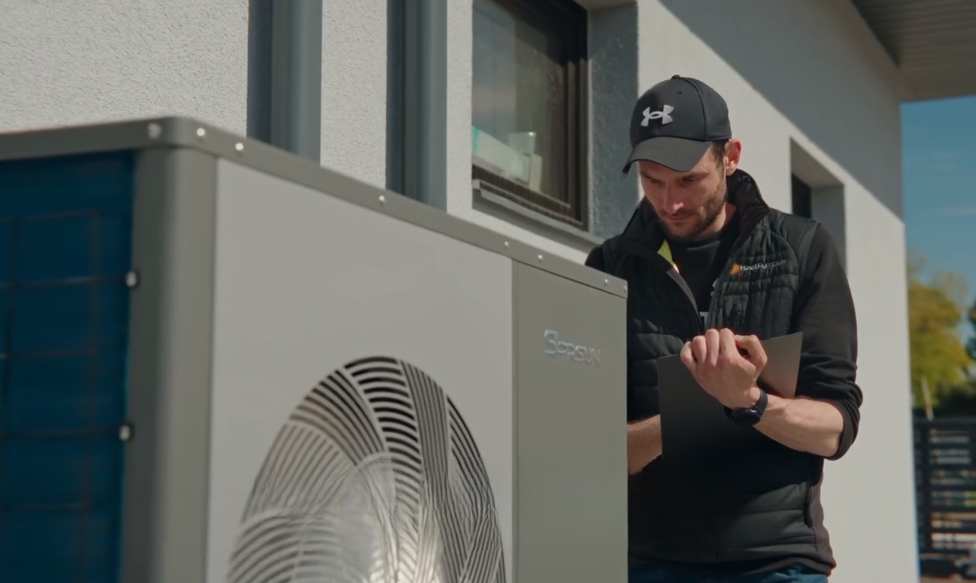 engineer is checking SPRSUN R32 heat pump