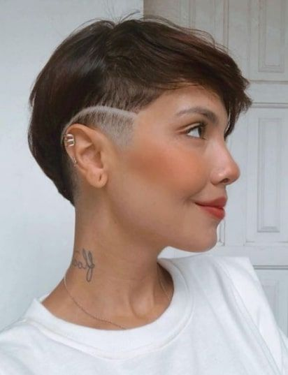a lady rocking an asymmetrical pixie