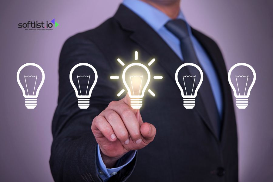 Businessman pointing at lightbulb symbol with Softlist.io logo beside him