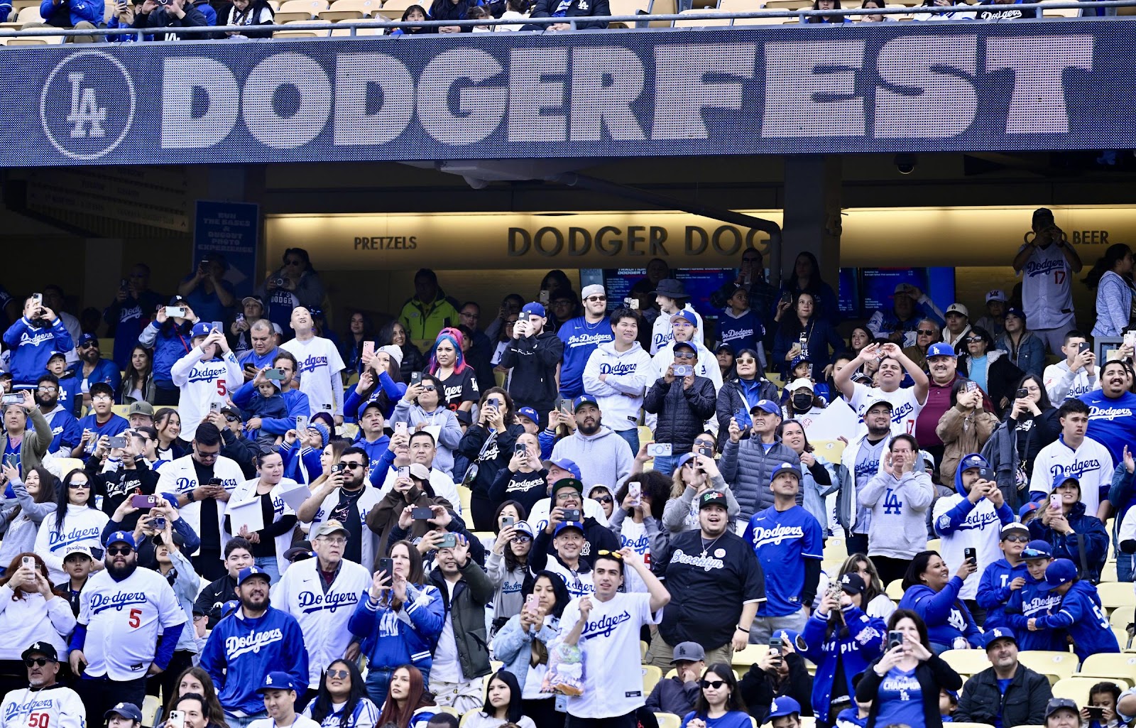 Fans watch as Shohei Ohtani of the Los Angeles Dodgers makes his way to the stage during DodgerFest at Dodger Stadium in Los Angeles on February 3, 2024 | Source: Getty Images