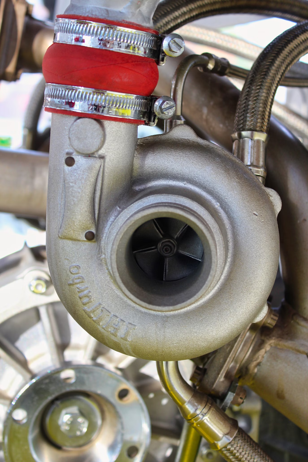 A grey turbo charger in a car