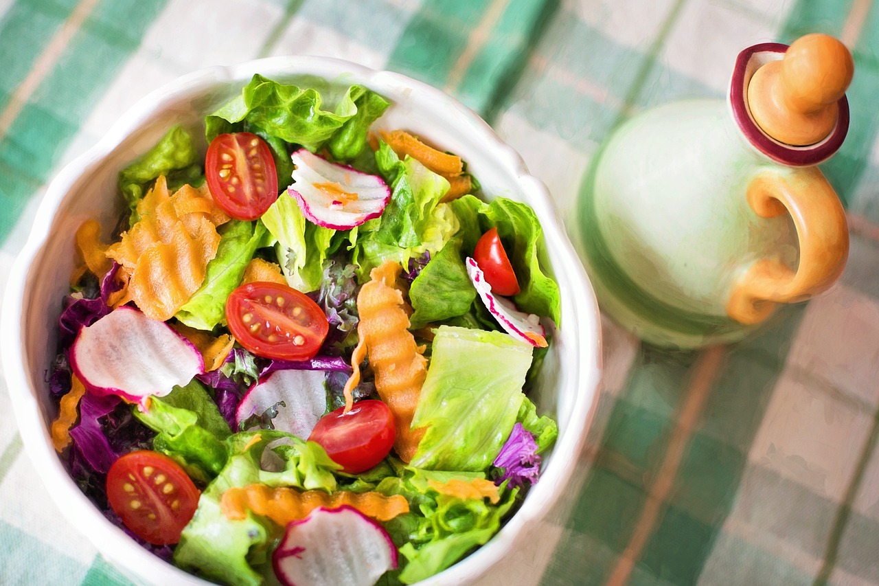 Is lavender plant edible? An image of lavender flowers sprinkled in a salad.