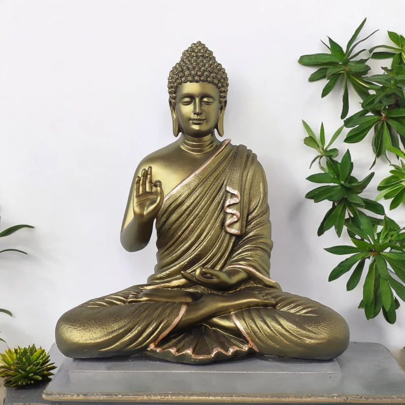 Buddha statue styled with greenery