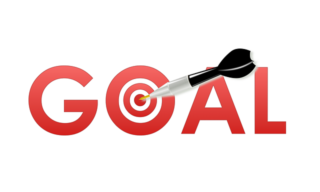 A dart hits the word "GOAL," representing success and determination in a vibrant and engaging manner.