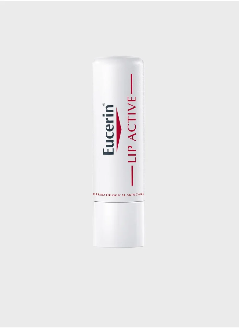 White tube of Eucerin Lip Active balm with red text, designed for sensitive, dry lips.