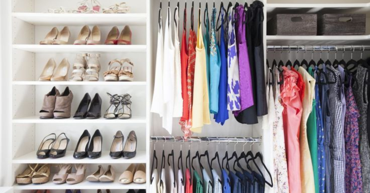 A closet filled with diverse clothing and shoes, prompting the question: What type of shoes do you instinctively look for when shopping?