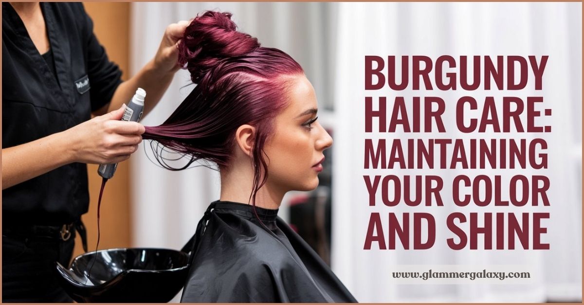 Hairstylist applying dye to client’s burgundy hair in salon.