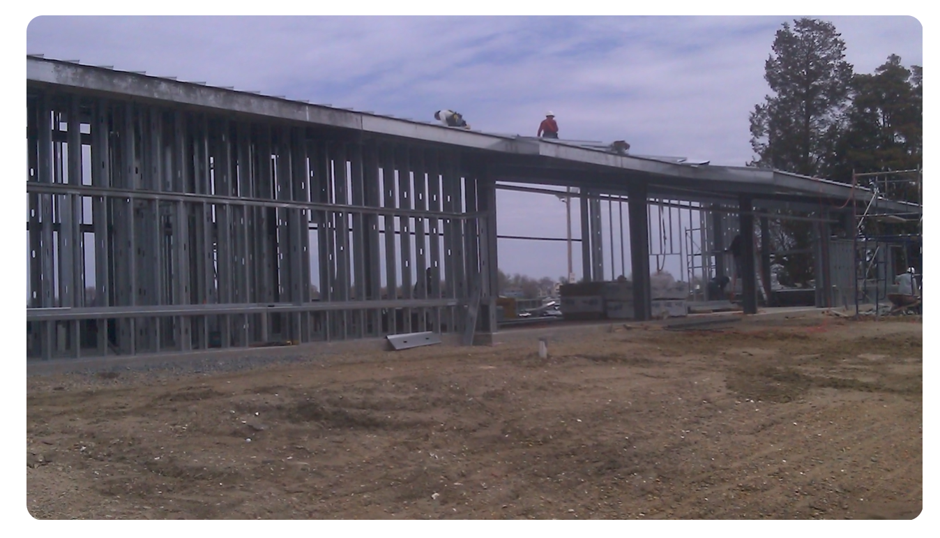 Our steel building erectors are hard at work completing a prefab metal project.