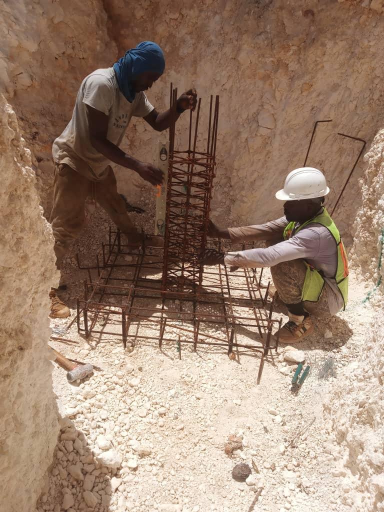 Men working in a pit

Description automatically generated with medium confidence