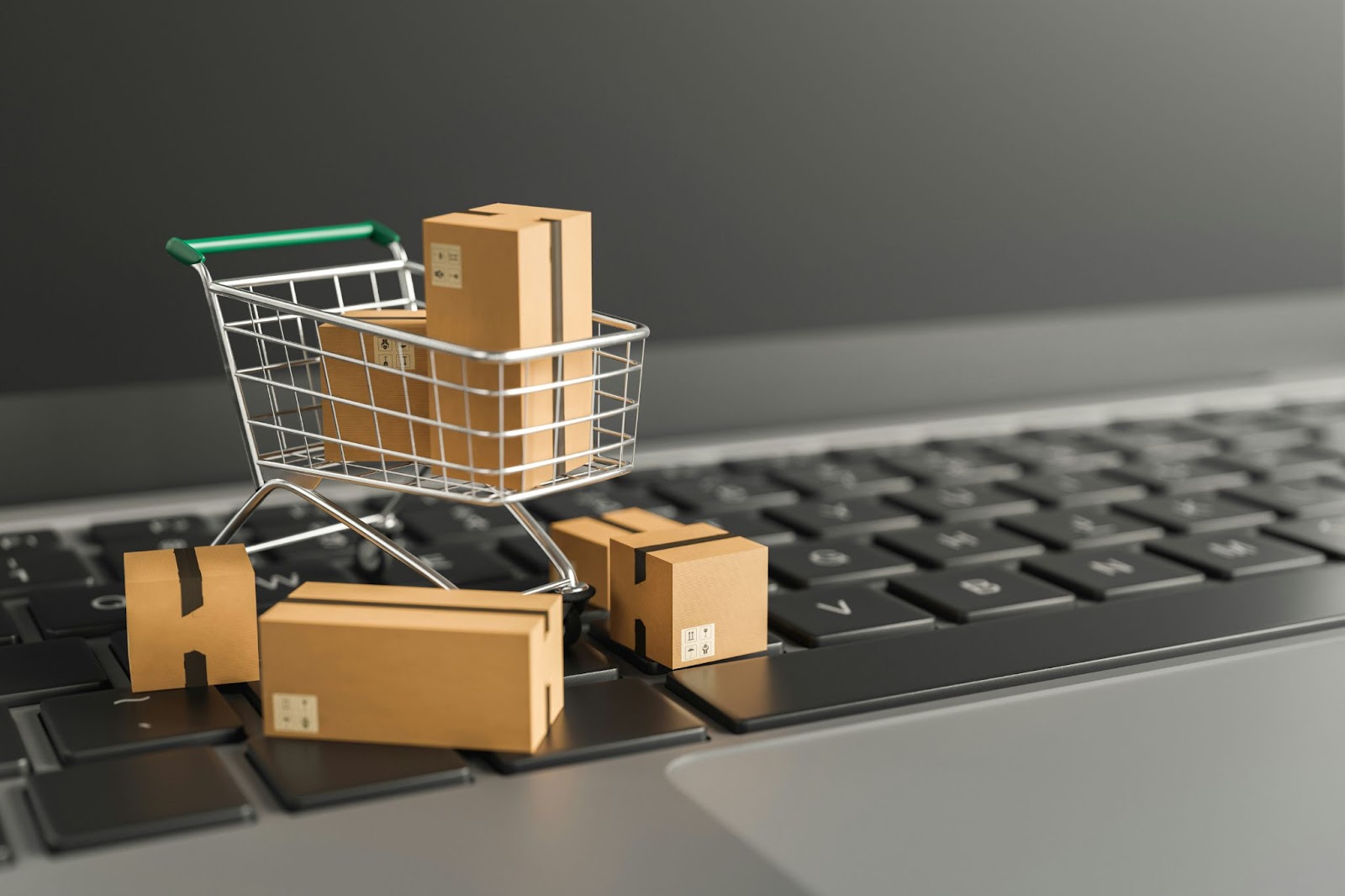 Tiny shopping backet on a keyboard.
