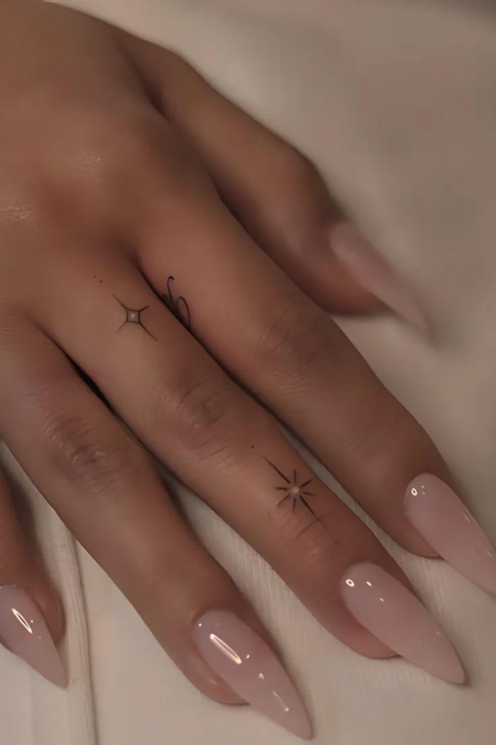 Starburst Finger Tattoo
