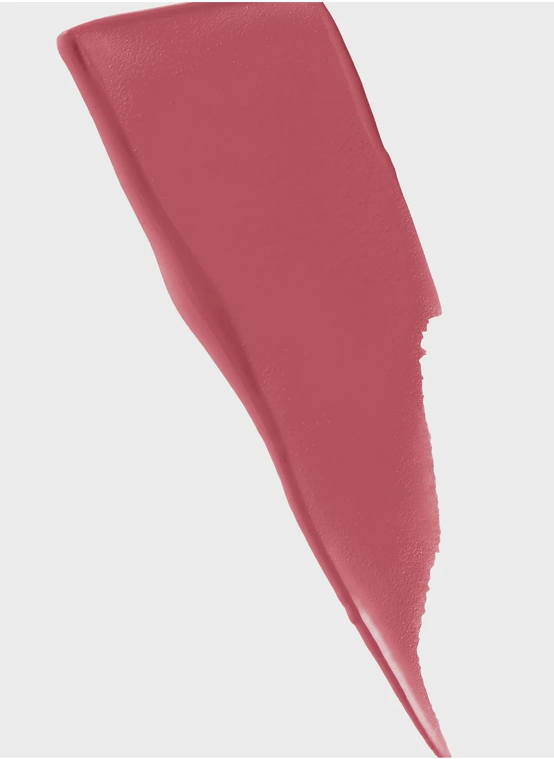 Maybelline pink matte lipstick swatch with a mauve undertone — perfect for everyday wear with a smooth, creamy finish.