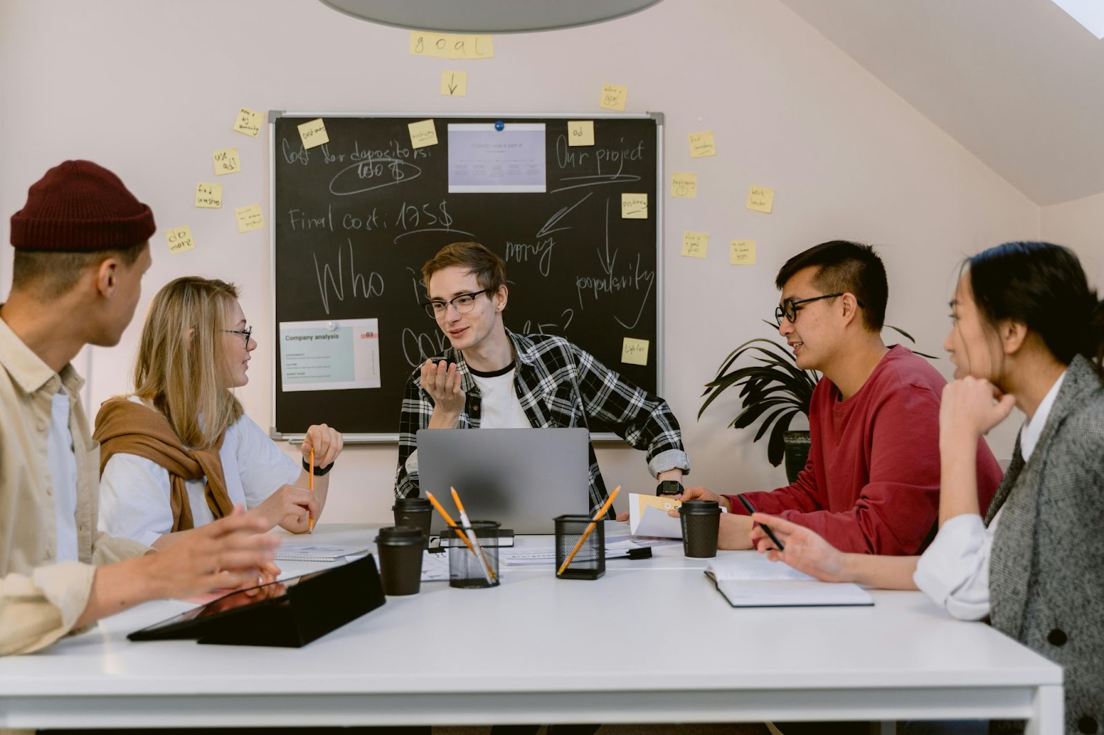 An office team having a meeting in a conference room.