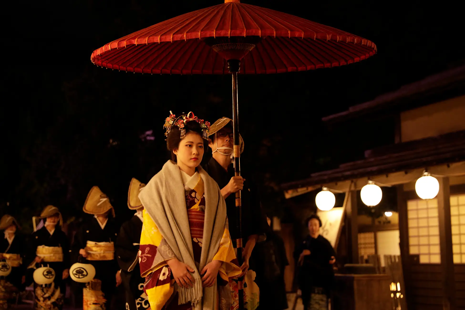 A stunning geisha parade at TOEI Kyoto Studio Park.