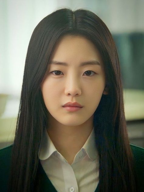 Nam Bo Ra on a white shirt and black suit 