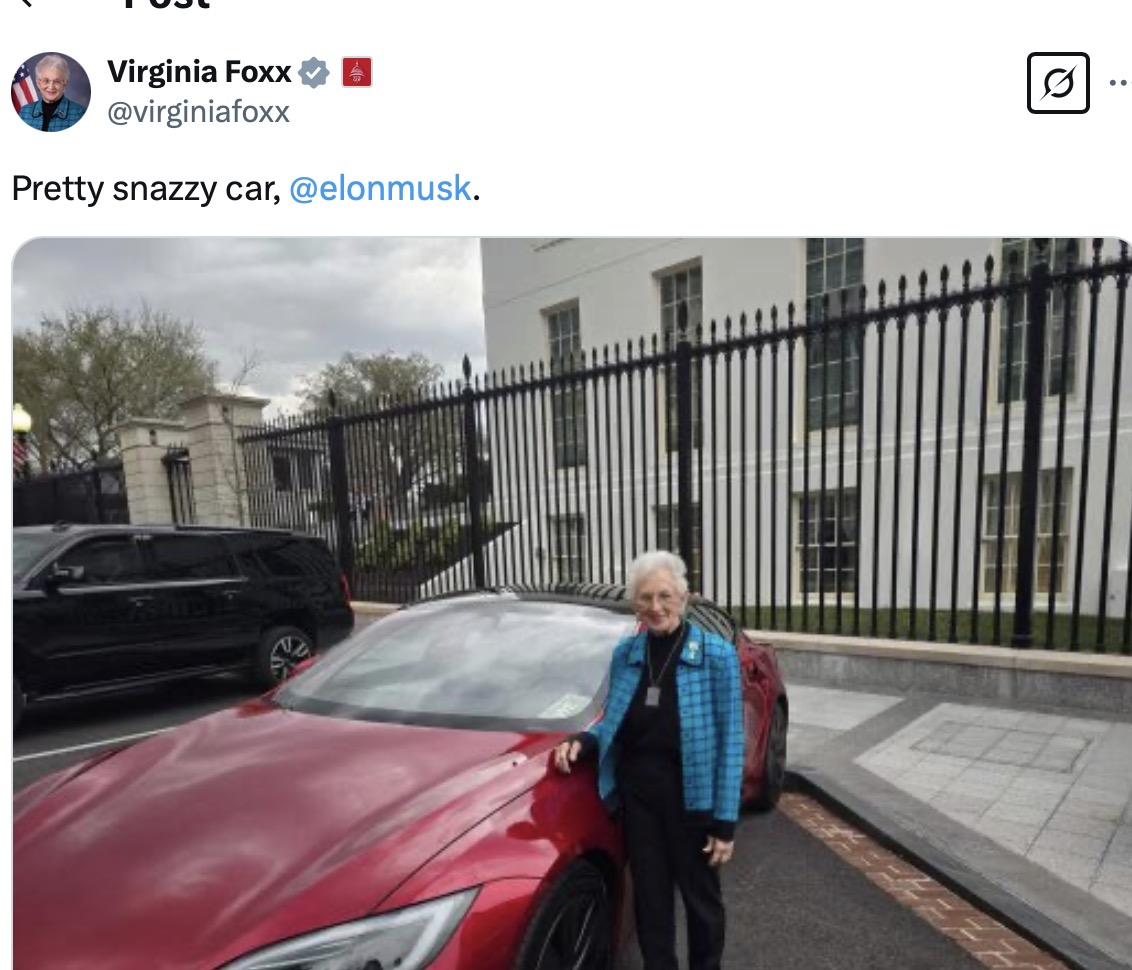 screenshot from Foxx's social media with her in front of a Tesla