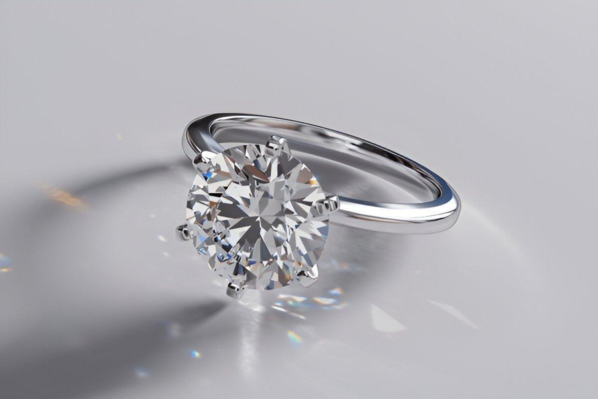 Solitaire diamond engagement ring on white background