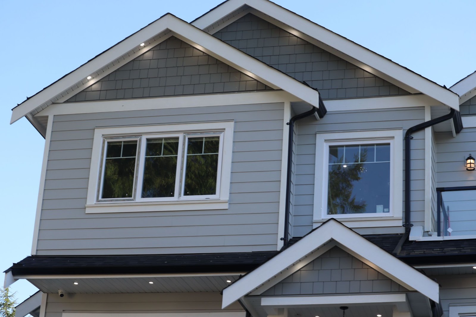 Low view of a home with siding. 