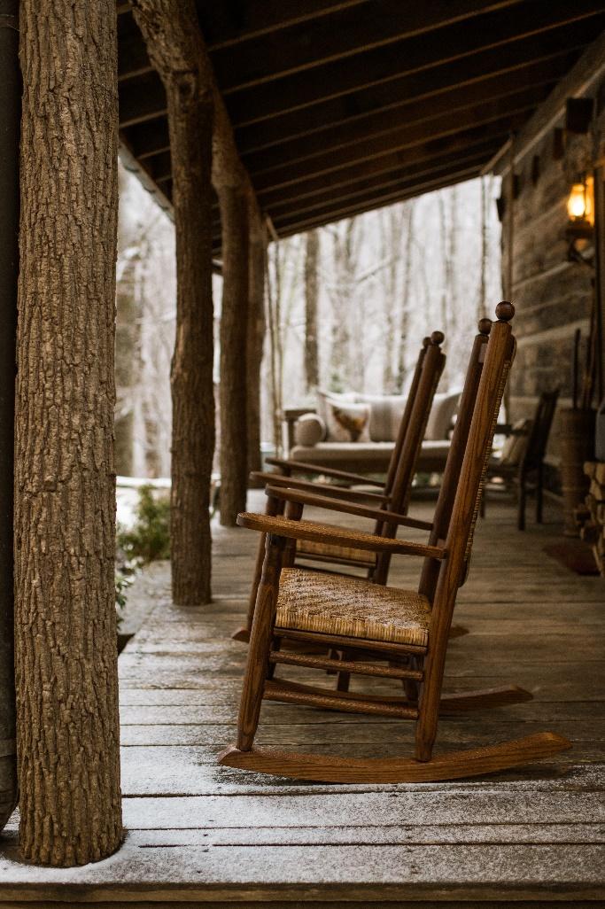 Rocking Chairs on the porch of The Retreats at Spring Creek Preserve.