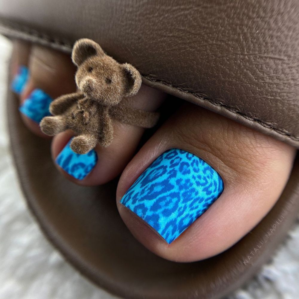 Close up of foot with radiant toe nail having Animal Print Nails