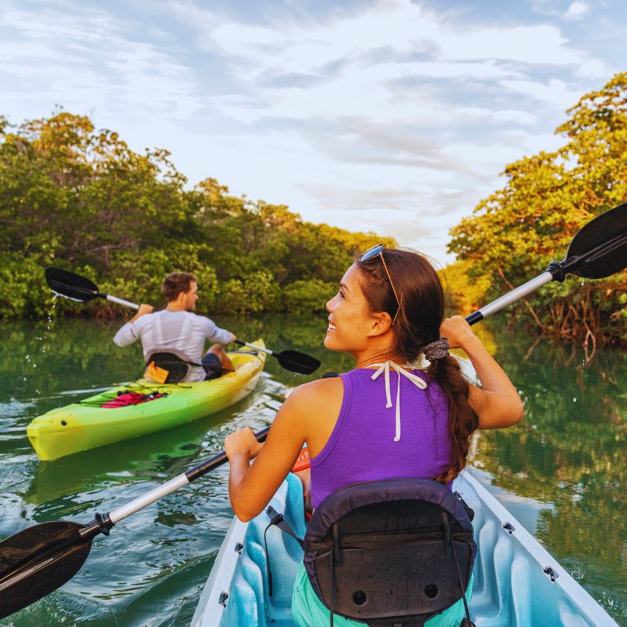 kayaking woman in purple