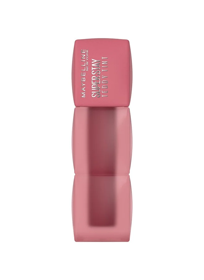 Maybelline SuperStay Teddy Tint lipstick in a soft pink hue — hydrating formula meets trendy design.