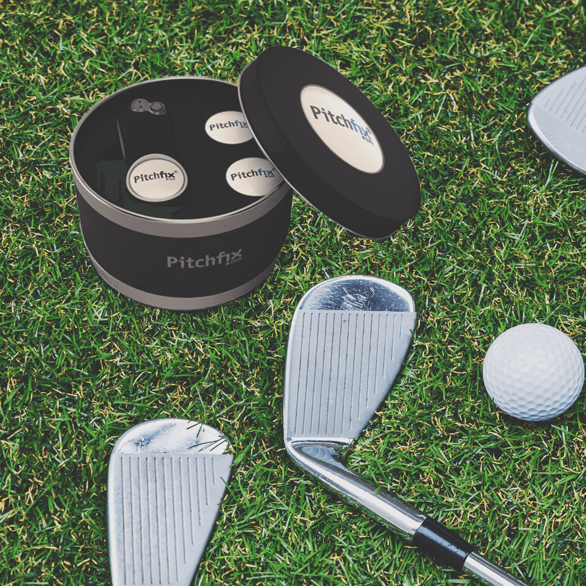 golf ball markers and divot tools