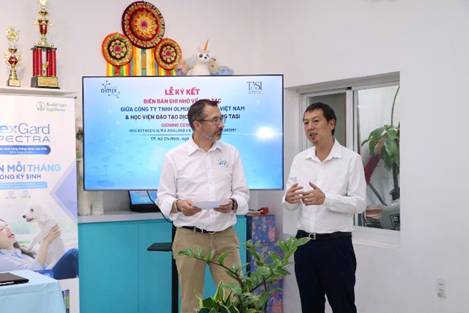 A group of men standing in front of a large screen

AI-generated content may be incorrect.