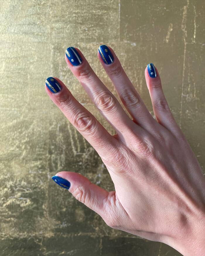 Hanukkah Nail Designs - Blue Nails With Abstract Gold and Silver Candles