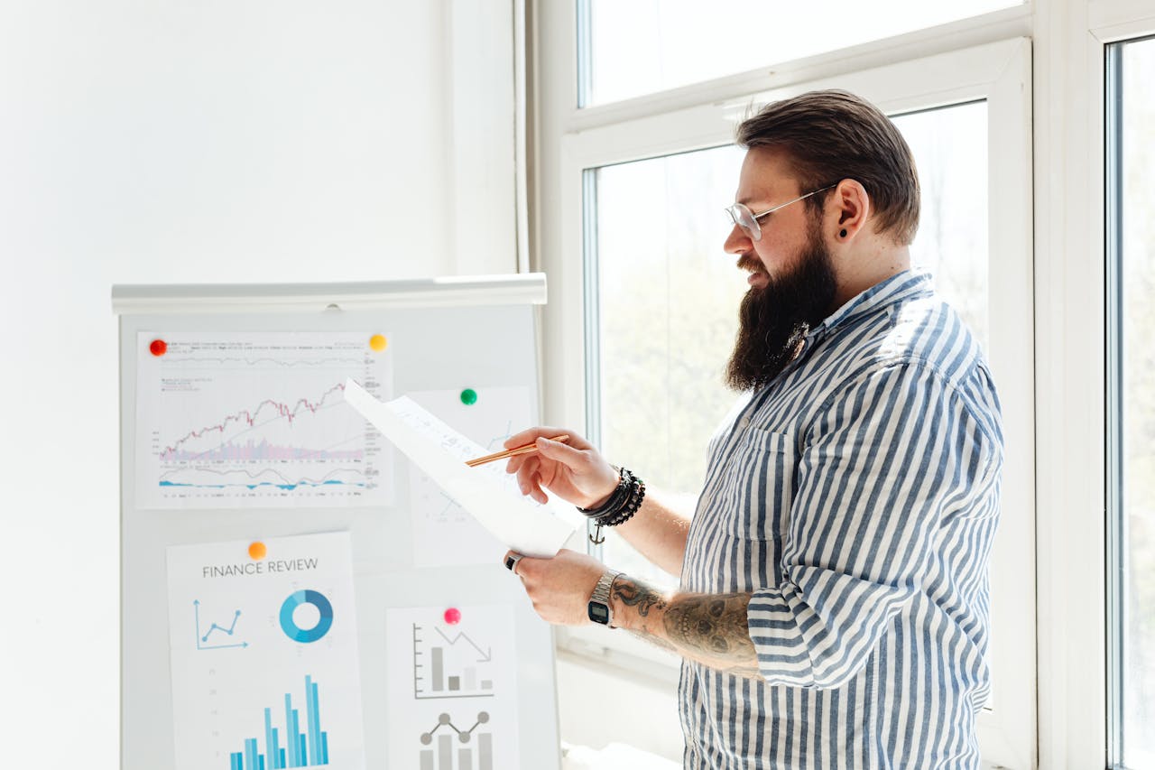 A man discussing business wins during quarterly business review