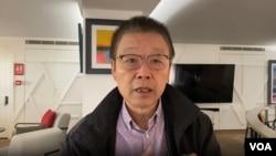 在英国从事移民法律工作的黄华 (美国之音 李伯安)