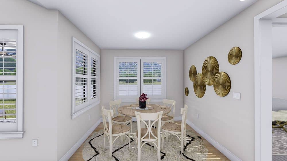 Dining area with a round dining set, patterned area rug, and round wall arts.