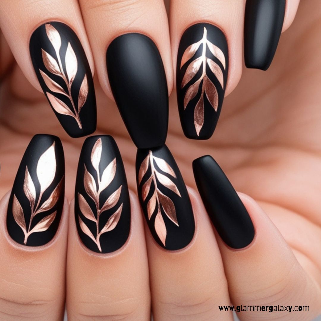 Black and Rose Gold Nail Designs having Elegant Black Nails with Rose Gold Leaf Detailing
