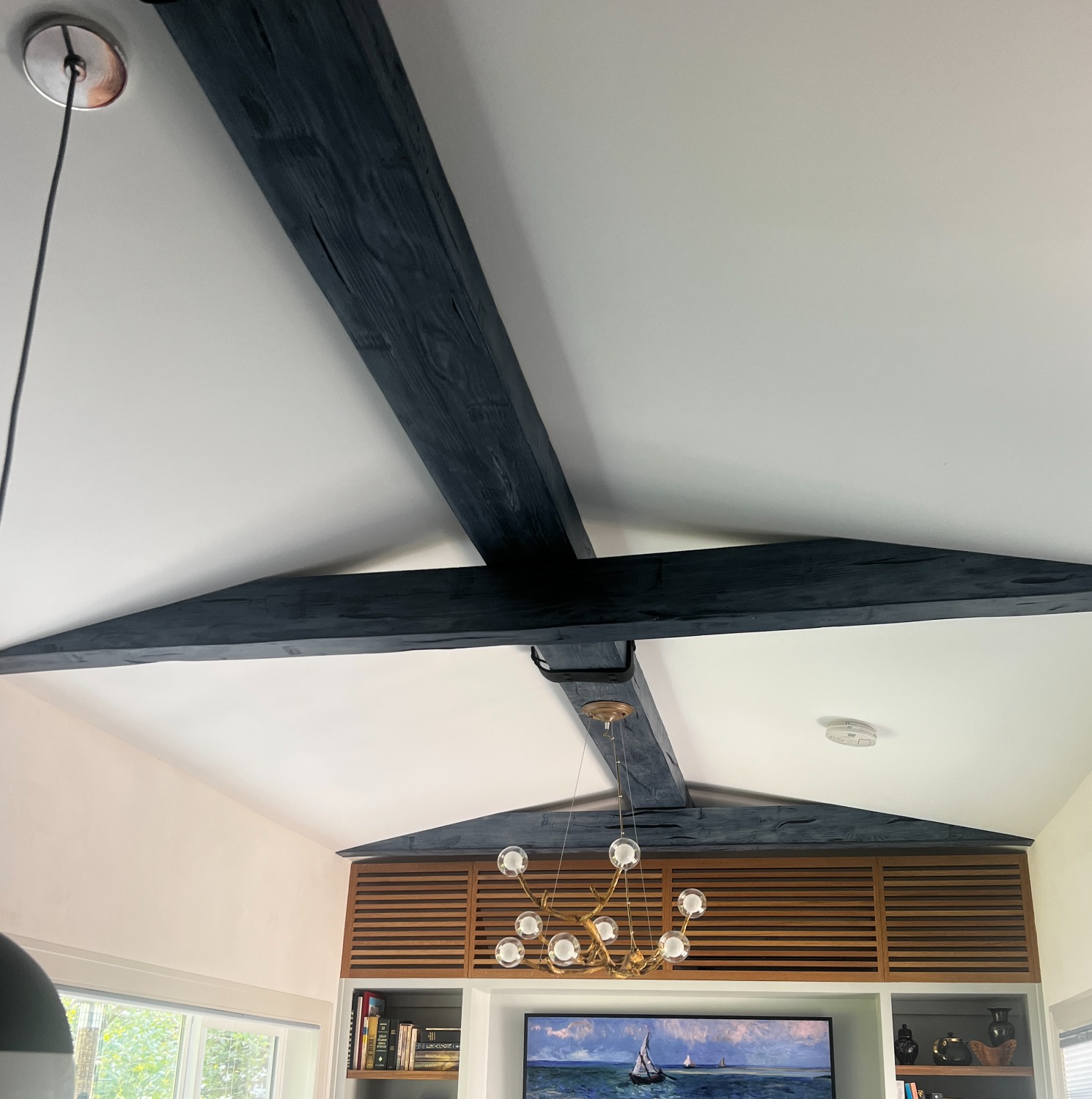 Painted faux wood beams on a ceiling