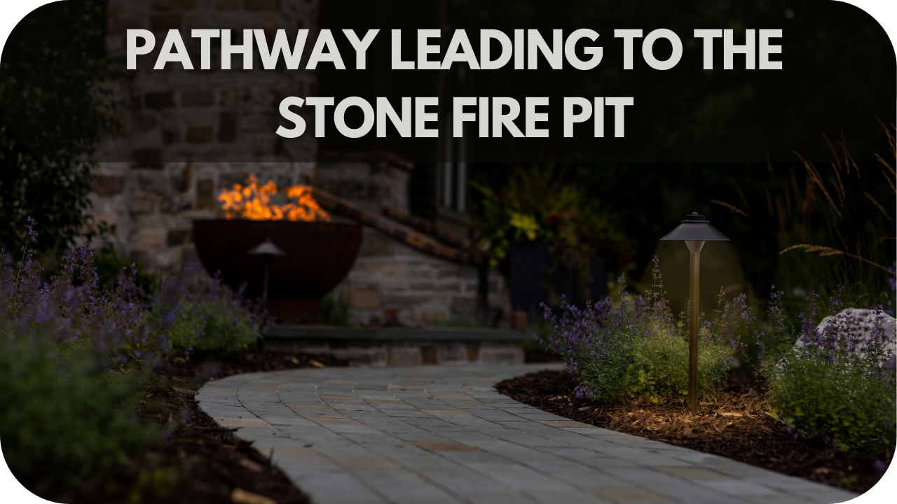 Create a stunning entrance with a pathway leading to a beautifully designed stone fire pit.