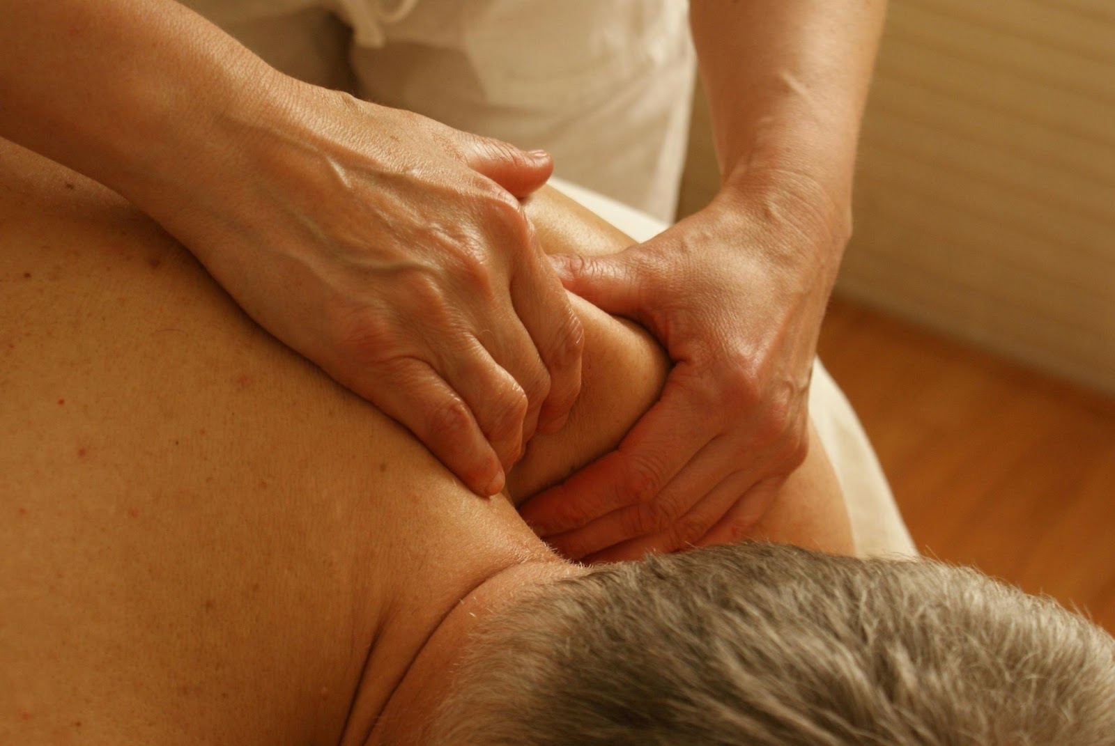 A man is getting a deep tissue massage.