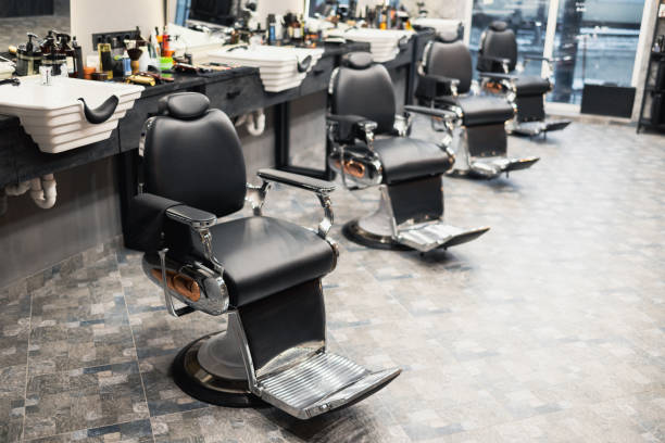 Well-equipped classroom setup in a barbering program designed for technical learning and theory.