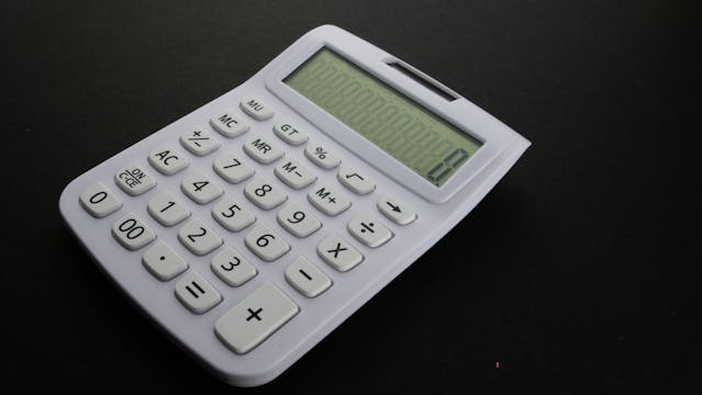 white calculator on table