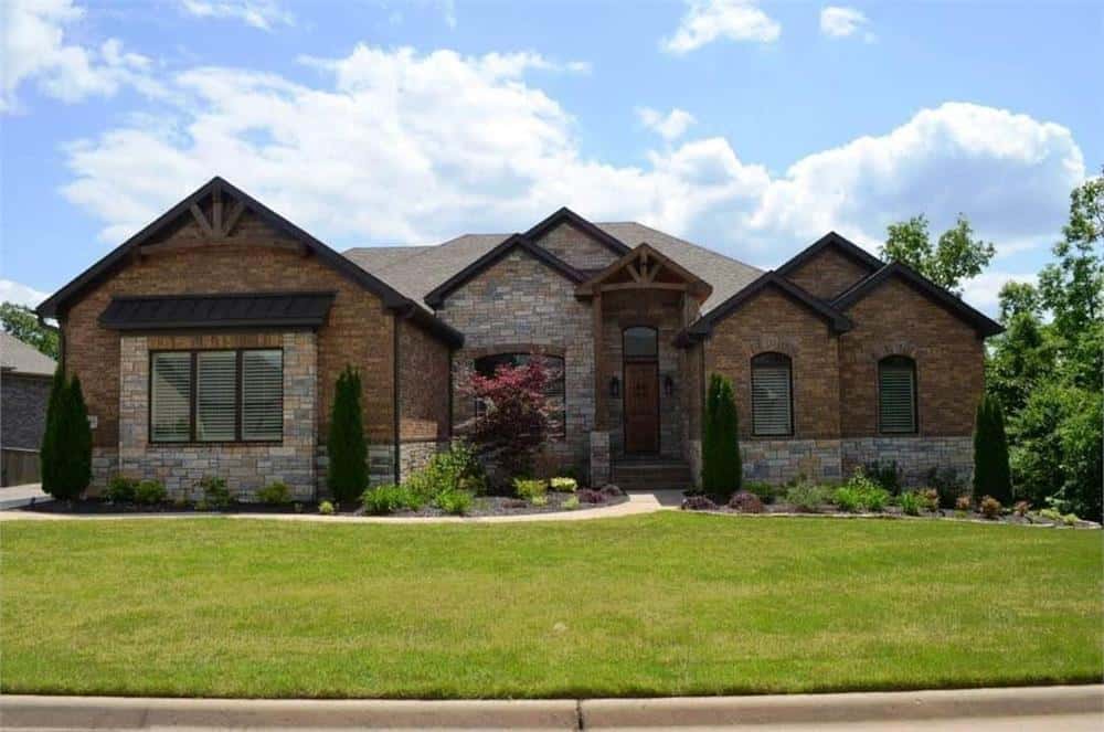 Single-Story Rustic Style 4-Bedroom Ranch for Sloped and Corner Lots with Wet Bars