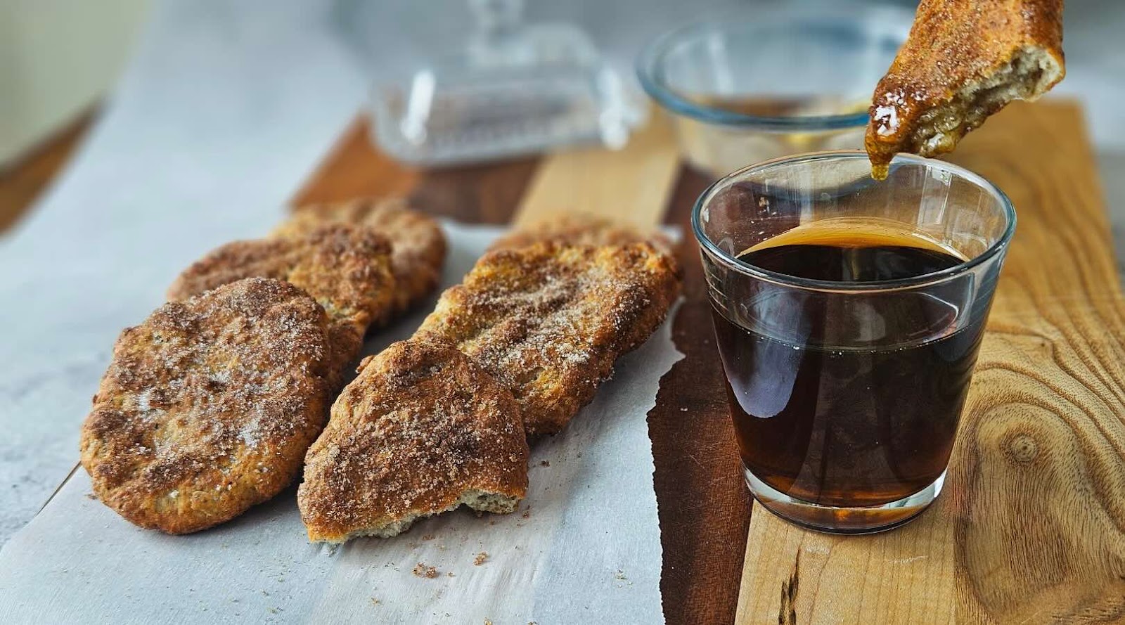 Air Fryer BeaverTails Created by a Registered Dietitian on a Wooden Board with Maple Syrup