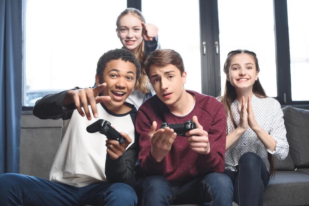 Group of teenagers playing a video game