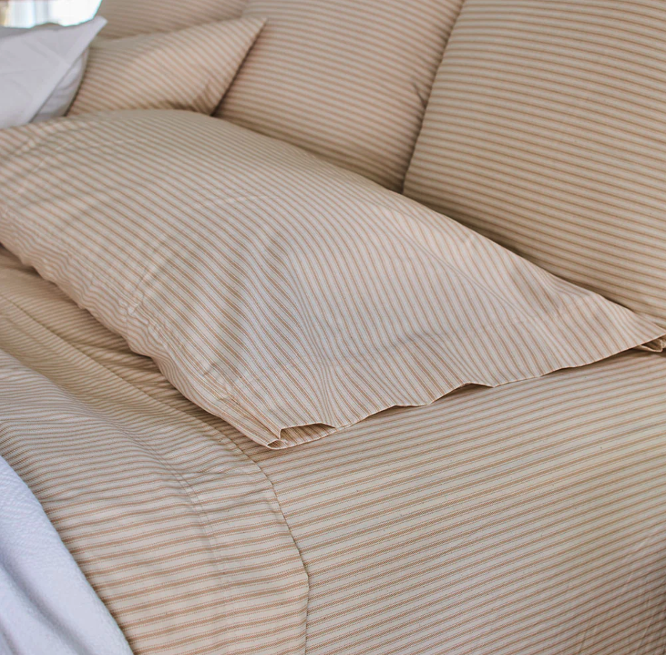 Our Ticking Stripe Pillowcase Set brings heritage design and eco-conscious farming