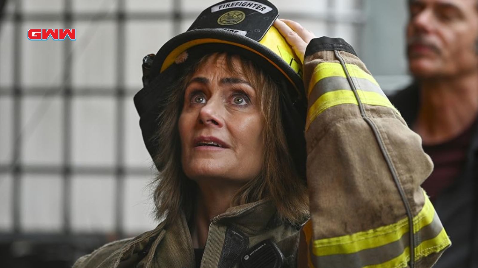 Fire Country Season 3: Diane Farr holding her hat in Fire Country Season 1