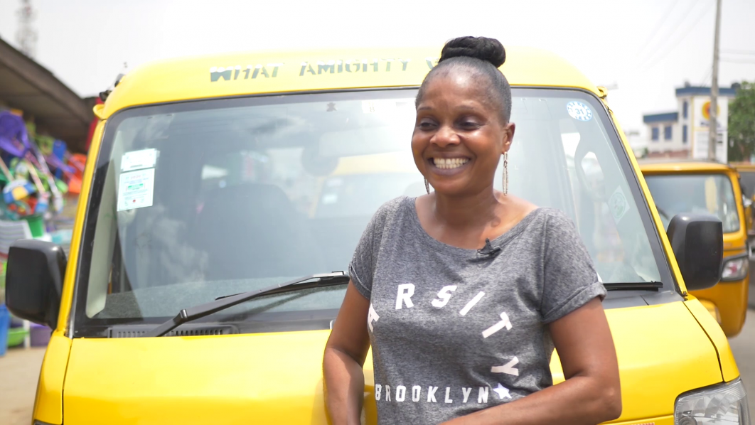 A person standing next to a yellow vehicle

AI-generated content may be incorrect.