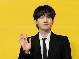 A picture of BTS members Suga
