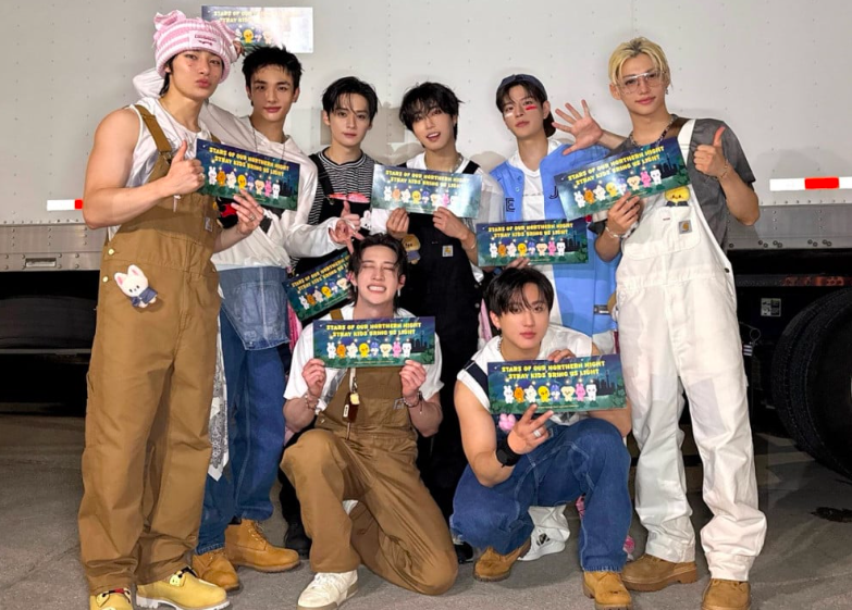 This contains an image of Stray Kids