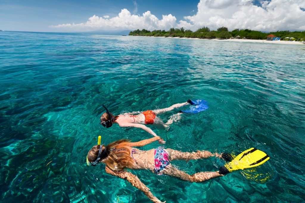 Snorkeling is just one of the water activities that groups can do in Miramar Beach!